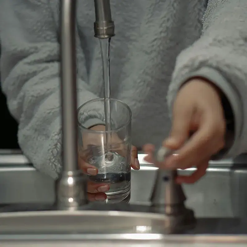 Filling glass with clean water