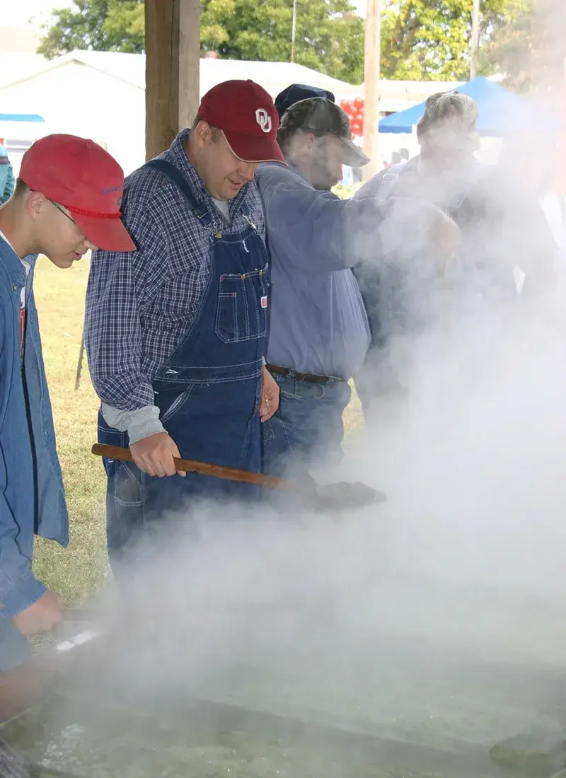 Men grilling outside